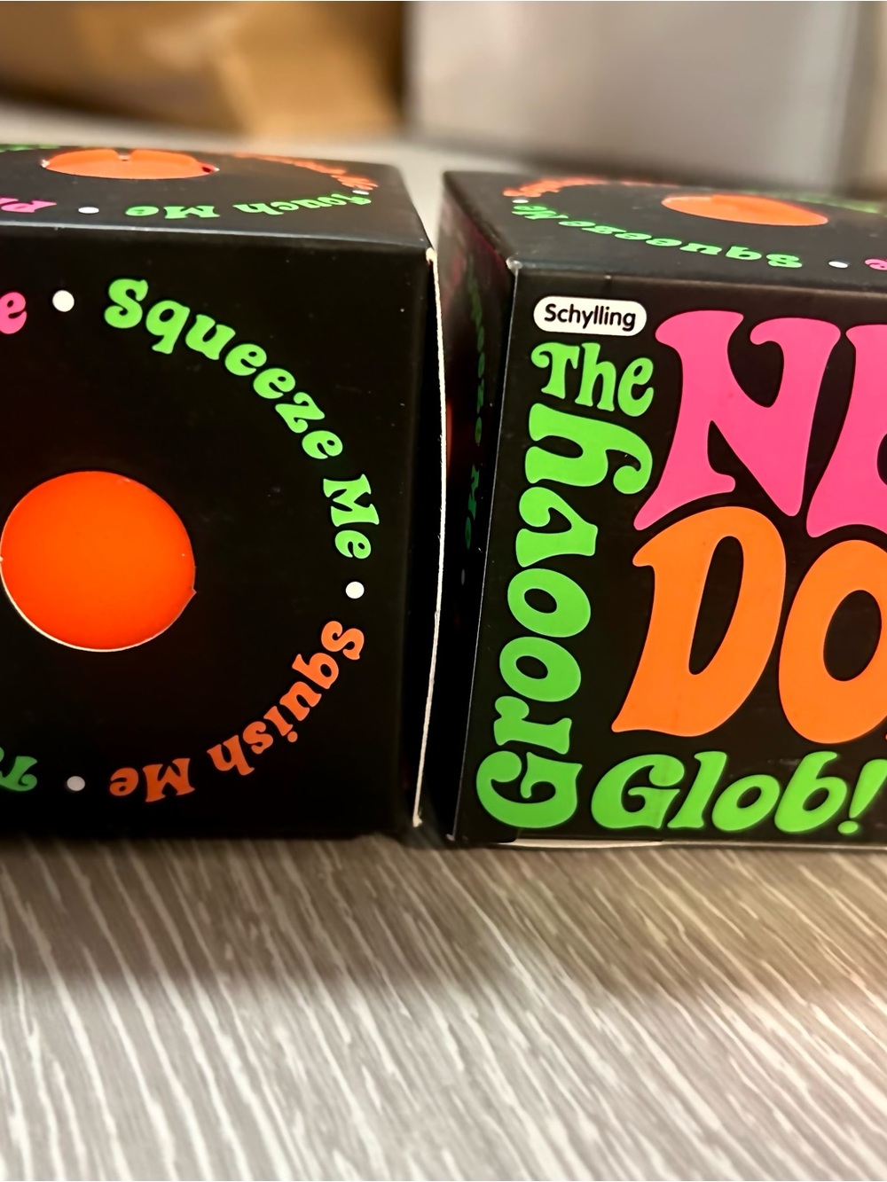 The Needoh Globe! Squeeze Ball - Bright Orange